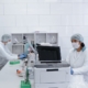 Lab technicians analyzing samples in a clean, modern laboratory.